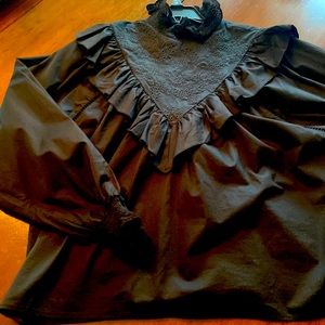 En Saison black ruffled and eyelet top. Size Medium. Never worn.